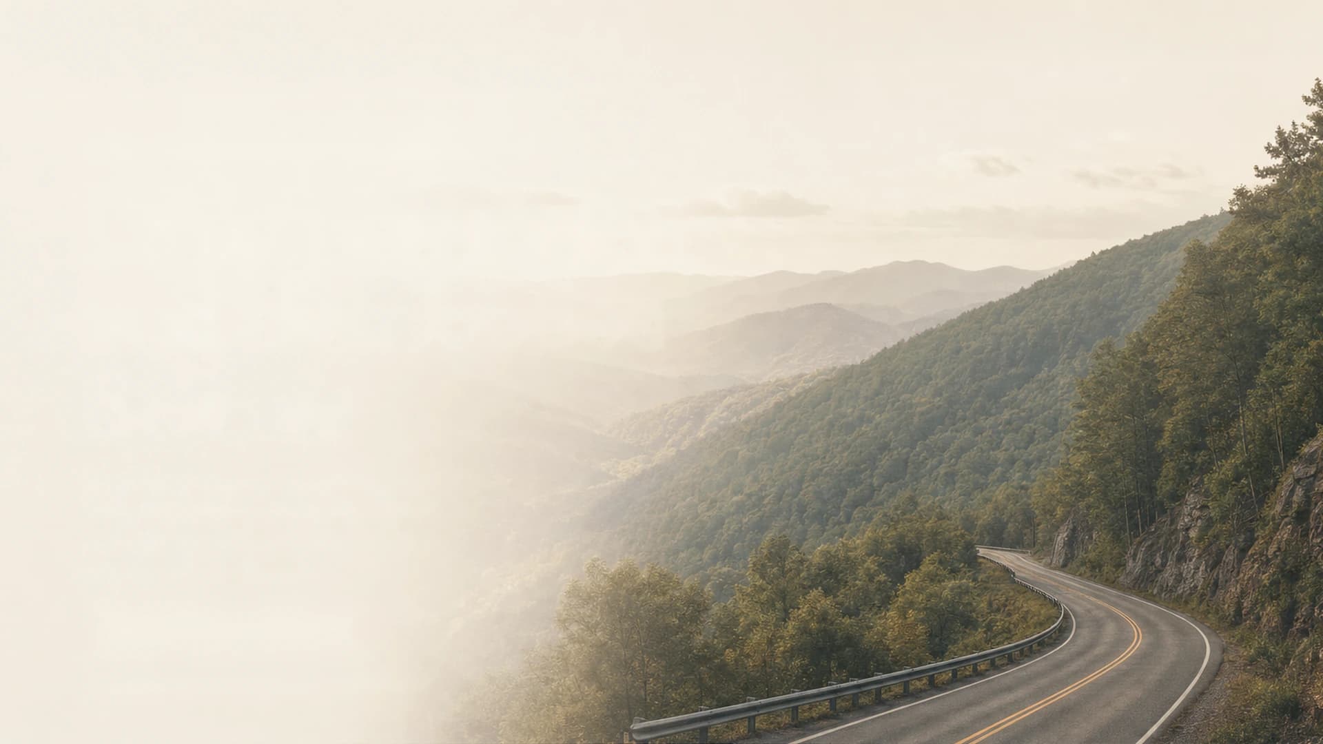 Mountain road curving along a forested ridge in Southwest Virginia